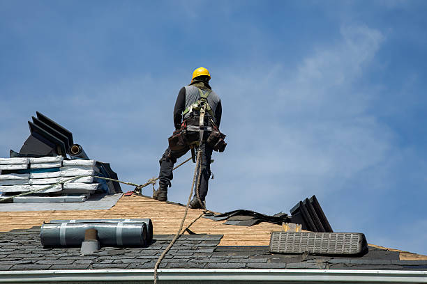 Professional Roof Replacement technician working in Rugby, ND